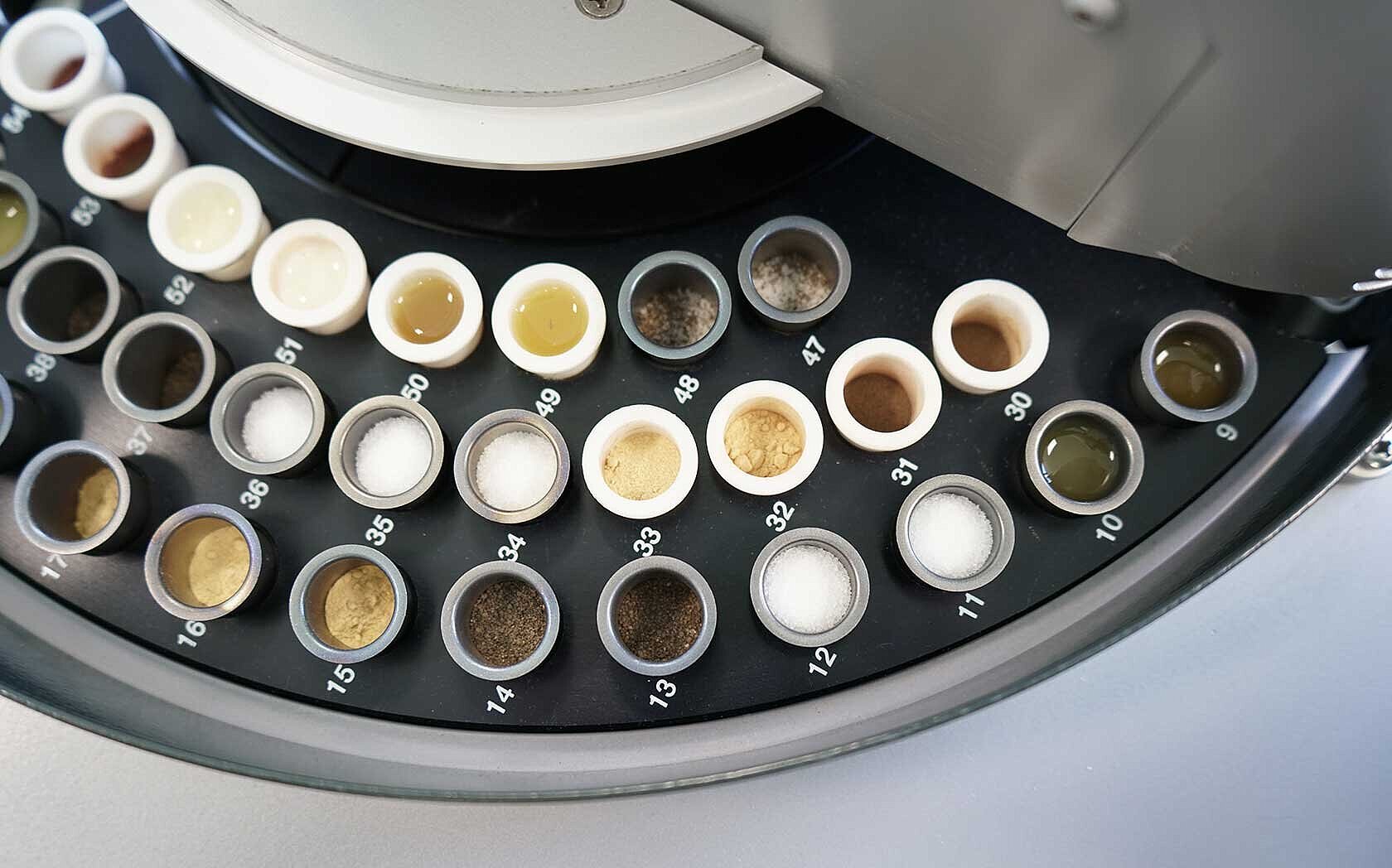 Autosampler with filled crucibles from top perspective