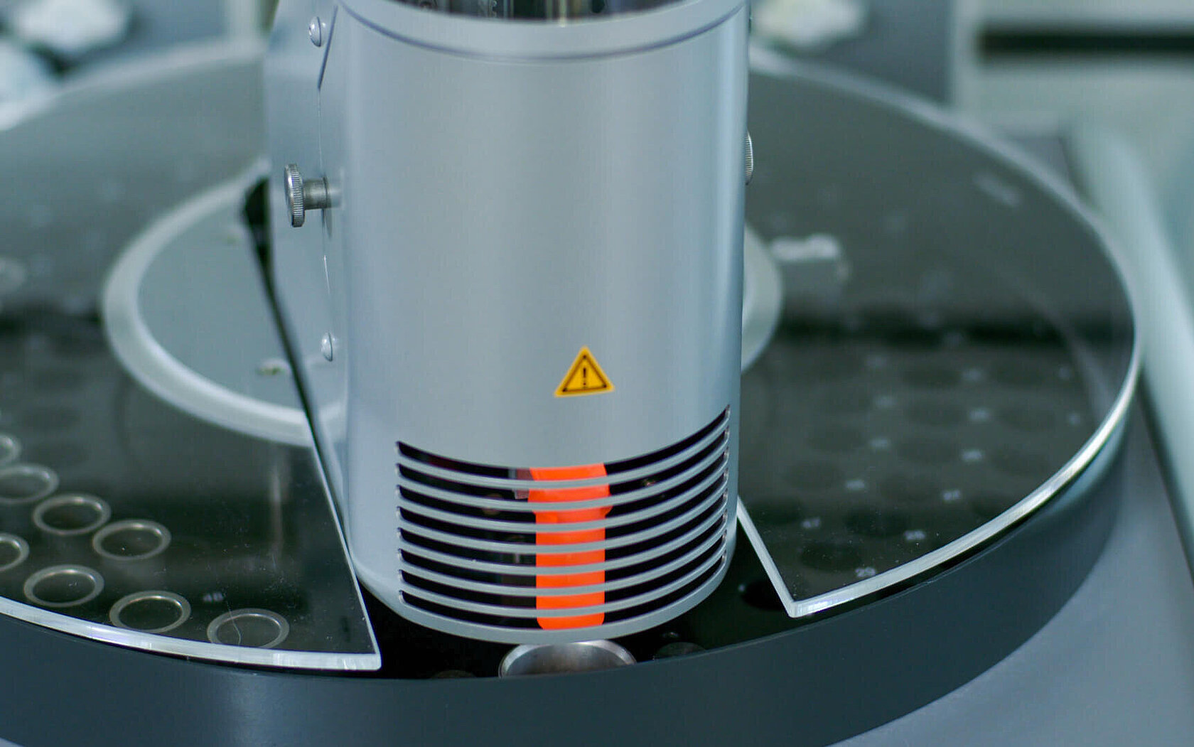 Gripper arm with crucible of the rapid MAX N exceed nitrogen and protein analyzer