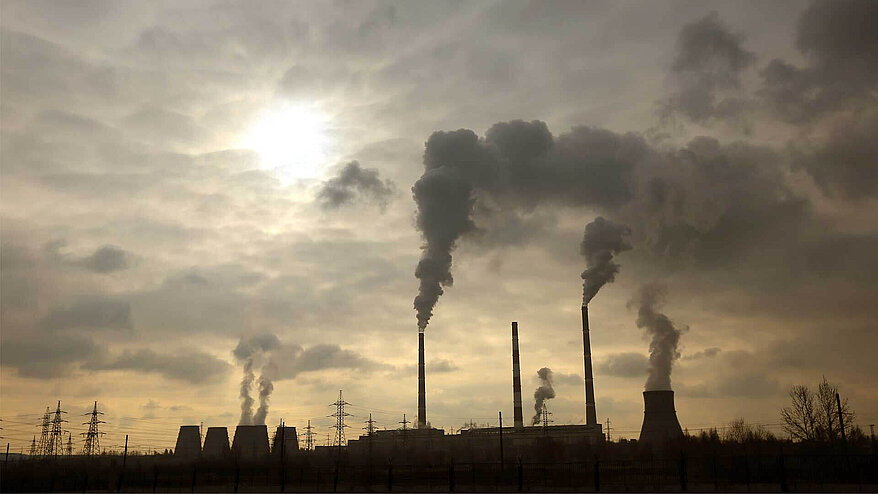 Plant with smoking chimneys