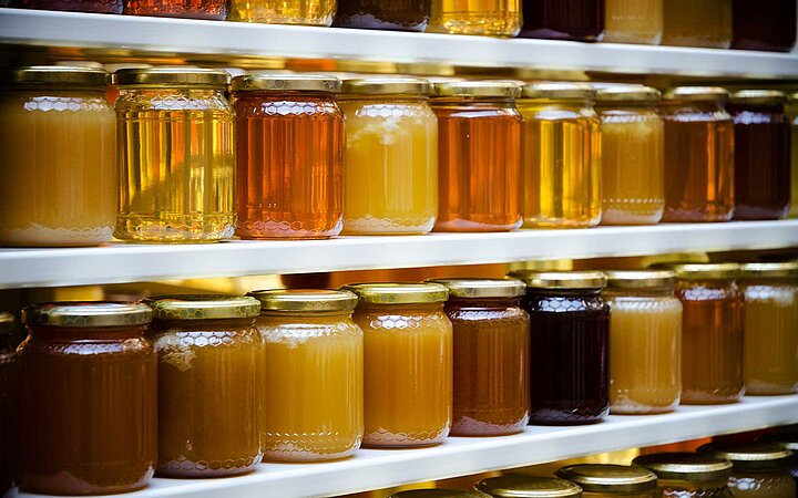 Honey jars in a shelf